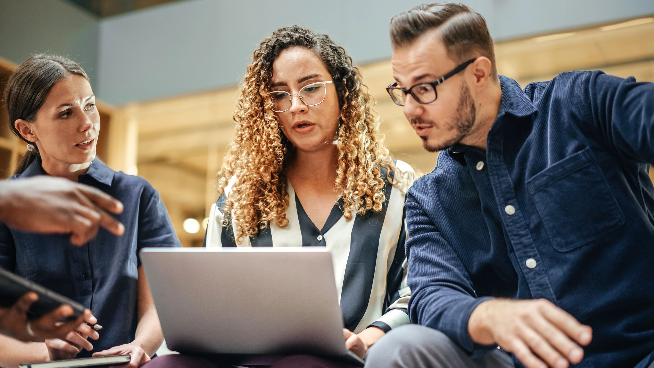 Business team discussing digital solutions in an office